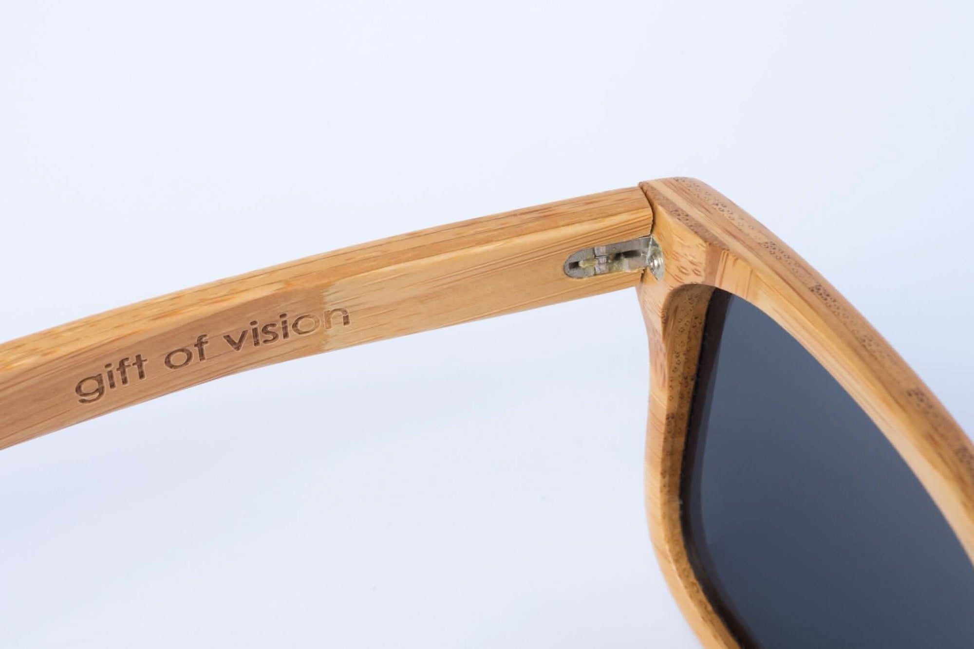 Panda CARVER Bamboo Wayfarer Sunglasses (Honey) Inside Left Arm View with &quot;gift of vision&quot; Embossed