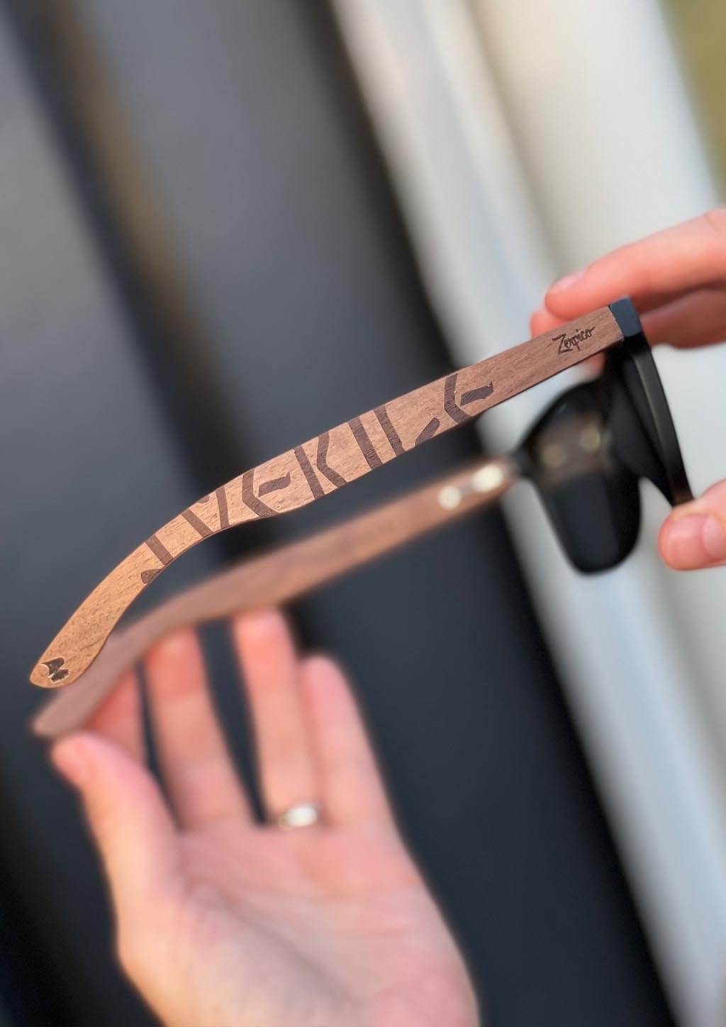 Zerpico SWEDEN VIKING RUNES Eyewood Engraved Wooden Sunglasses - In-Hand View Highlighting Hand-Carved Wooden Arms